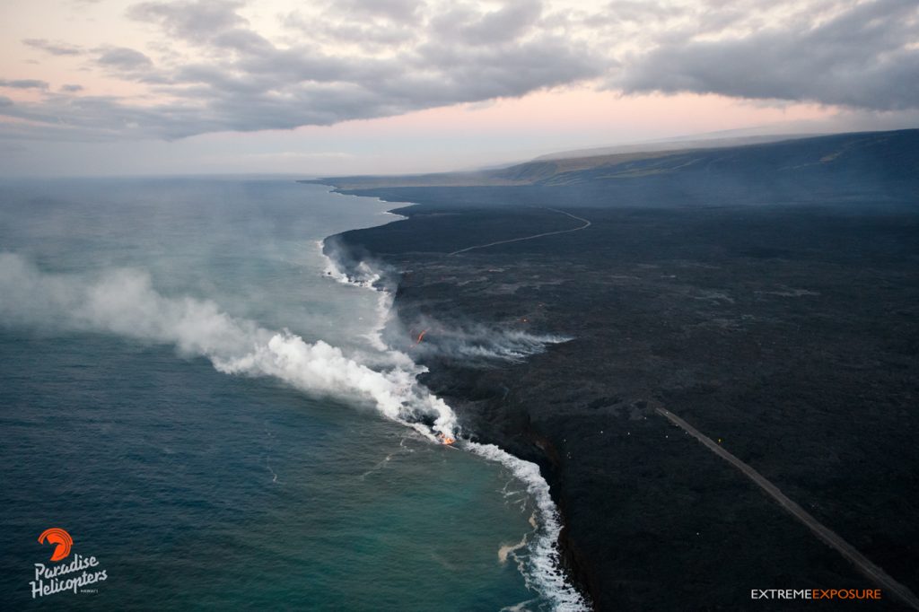 7 Flow 61g continues to pour into the sea at Kamokuna. Now more than a half-mile wide, numerous point of entry were visible, with the largest plume rising from the eastern delta. Hawaiian Helicopters, Aug. 25, 2016.