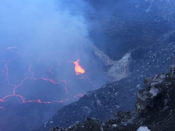 Rocks from the east rim of Kīlauea Volcano's summit vent fell into the lava lake at 10:02 p.m., HST, on Saturday, August 6, triggering an explosive event that hurled fragments of molten and solid rock onto the rim of Halemaʻumaʻu Crater. USGS?HVO photo.