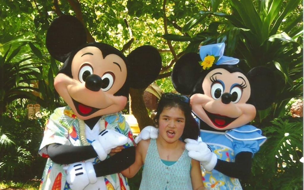 Have fun and support Big Island terminally and chronically ill keiki by attending the All You Can Eat Ice Cream Party on Sunday, Oct. 16, from 11 a.m. to 3 p.m. Pictured here is Lindsey Kalini, who resides in the Hilo area. Her dream was fulfilled when she went to the Disney Resort on O‘ahu and met Mickey and Minnie Mouse. Courtesy photo.