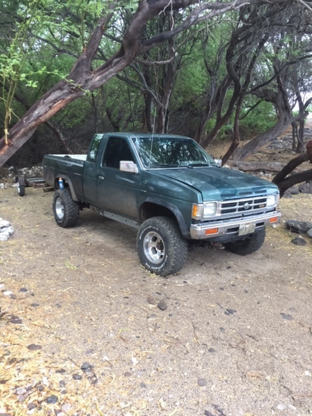 The Coast Guard is searching for two possible persons in the water off of the Big Island, five miles north of Kawaihae and the Kohala district, Dec. 4, 2016. A green Nissan truck and trailer believed to belong to one of the boaters was left at the campsite. Courtesy photo.