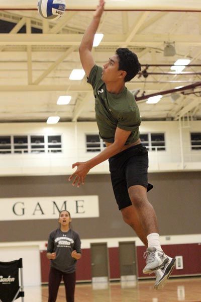 Keali‘i Kuahuia shows his "kill-ability" at the HI-PAL Youth Volleyball Clinic. Courtesy photo.