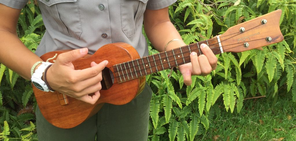 Ranger strumming ‘ukulele. NPS photo.