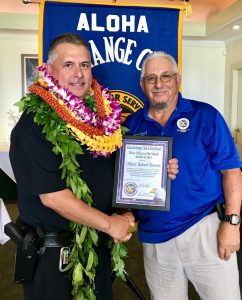 Officer of the Month Officer Robert Stewart John Stewart (father) presenting the award. PC: Hawaii Police Department, April 2019